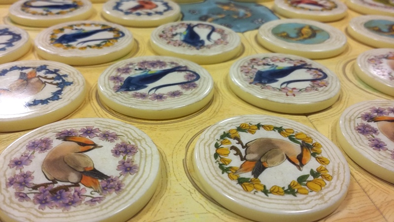 Bild Spielsteine mit abgebildeten Vögeln