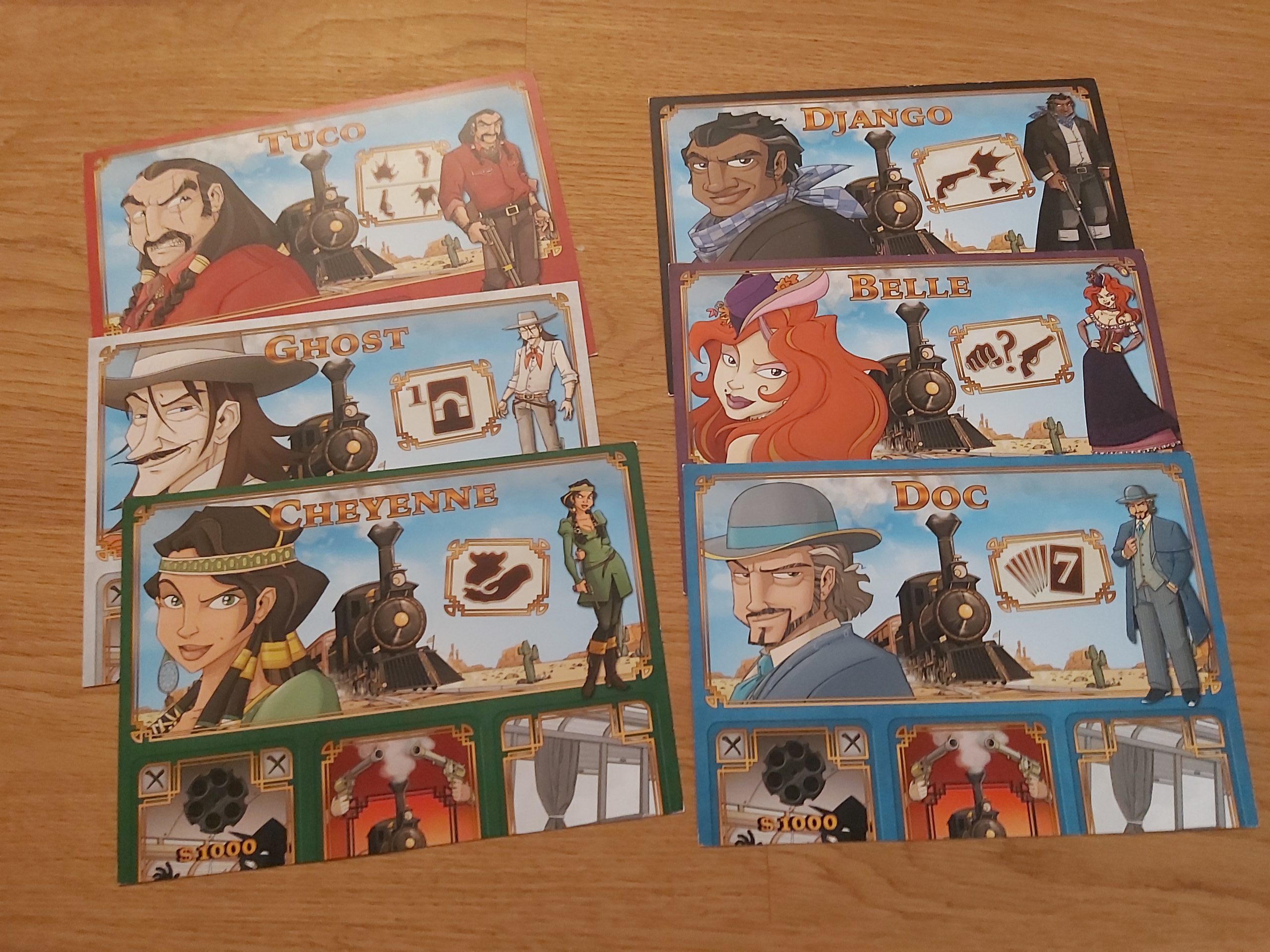 Zu sehen sind alle Charaktertableaus von Colt Express.