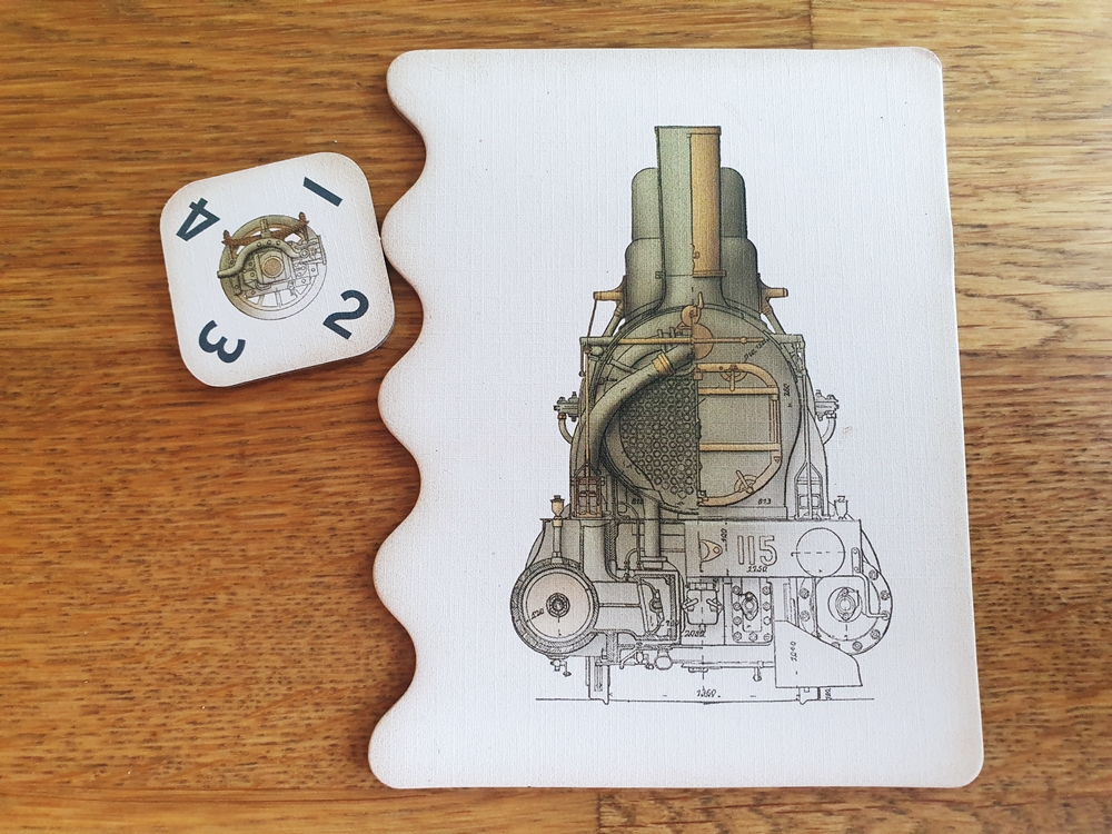 Der Rundenzähler: eine Karte mit runden Aussparungen. Der Rundenmarker rollt praktisch nach jeder Rund eins weiter