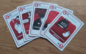 Zu sehen sind die Nö-Karten von Explodding Kittens.