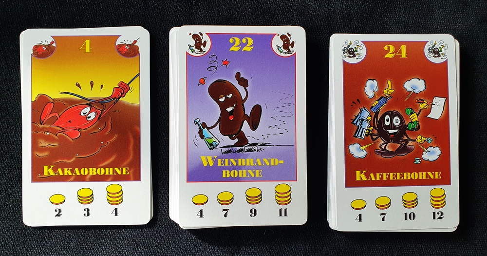 Drei Stapel mit neuen Bohnenarten