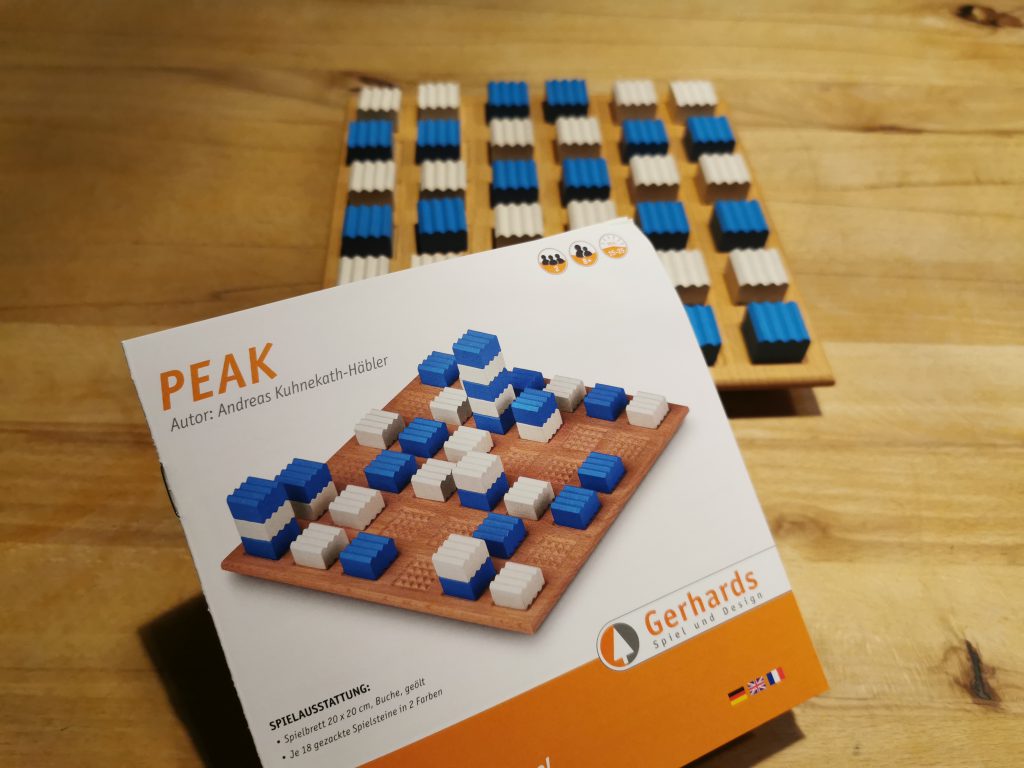 Peak - Packungsinhalt: Anleitung, Steine und Spielbrett