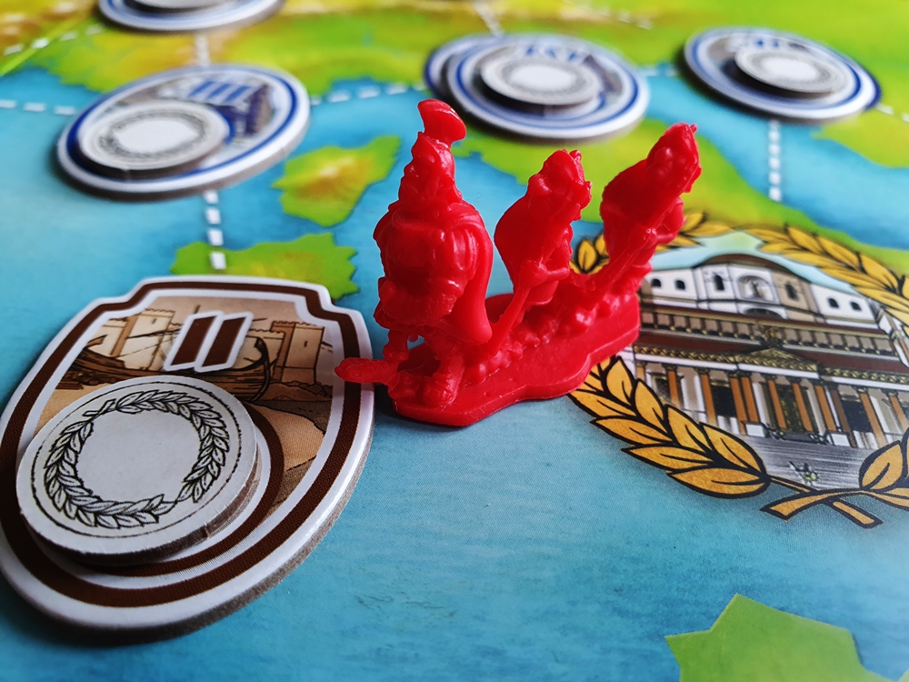 Spielplan, auf dem eine erste Strasse besetzt wird