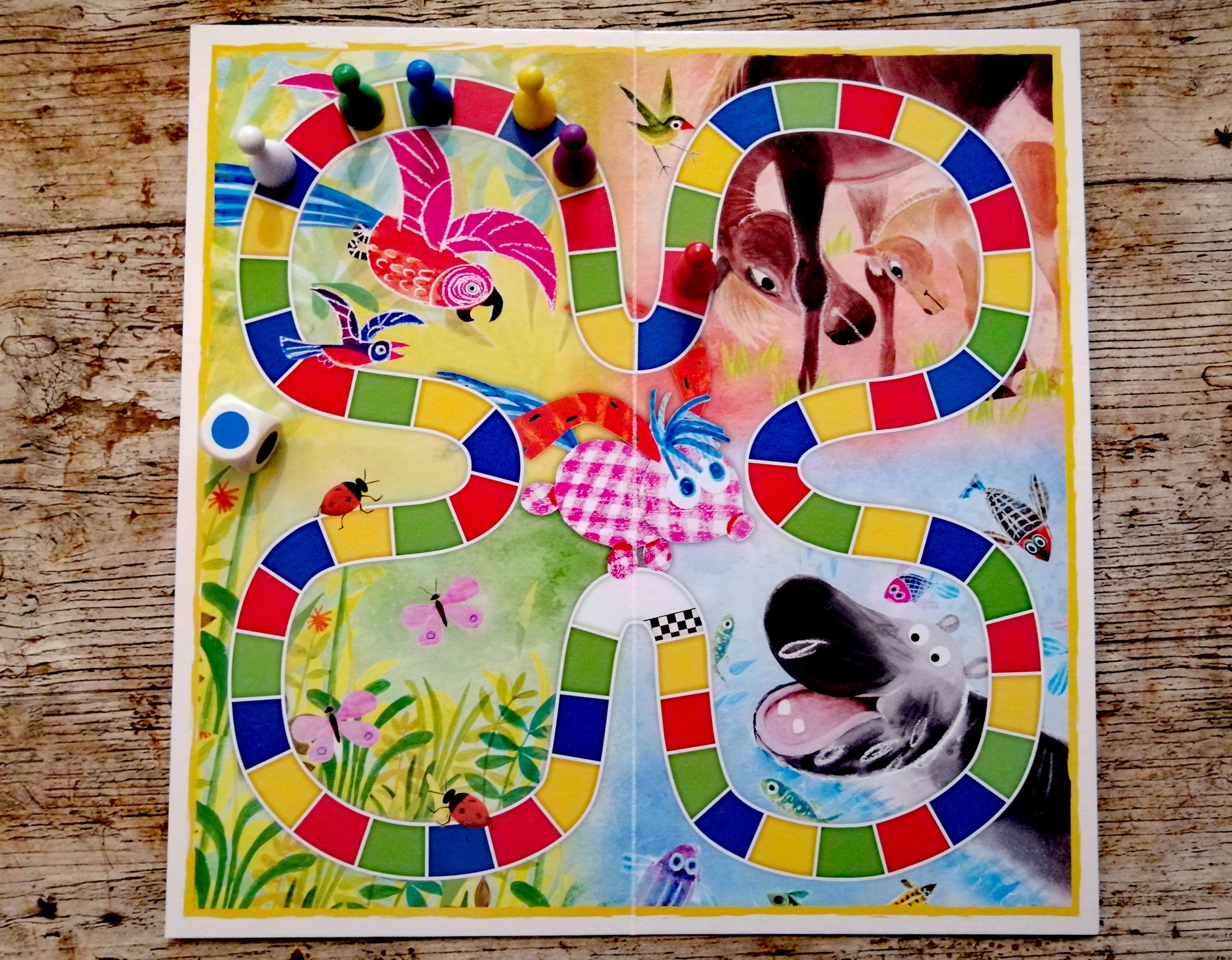 Farb-Wettlauf Spielbrett. Die Zeichnungen sind wie im Kinderbuch.