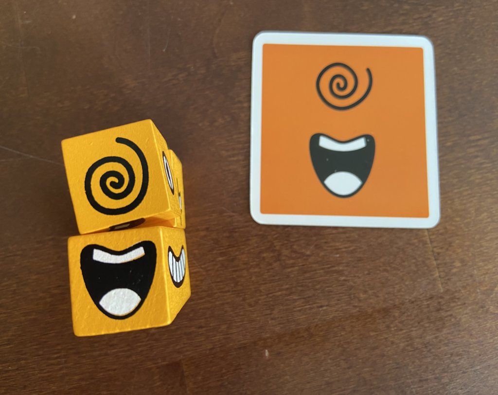 Aufgabenkarte plus das richtige Würfelgesicht. 