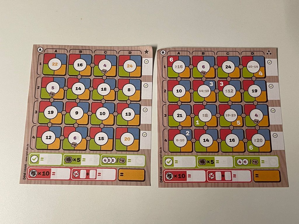 Auf dem Bild sind die zwei Spielvarianten von Colour Square abgebildet.