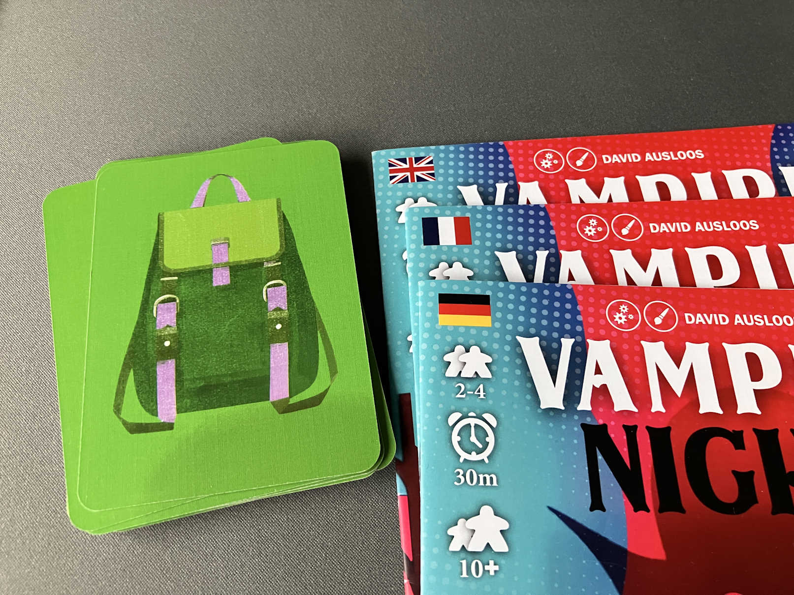 Drei Anleitungshefte. Englisch, Französisch, Deutsch