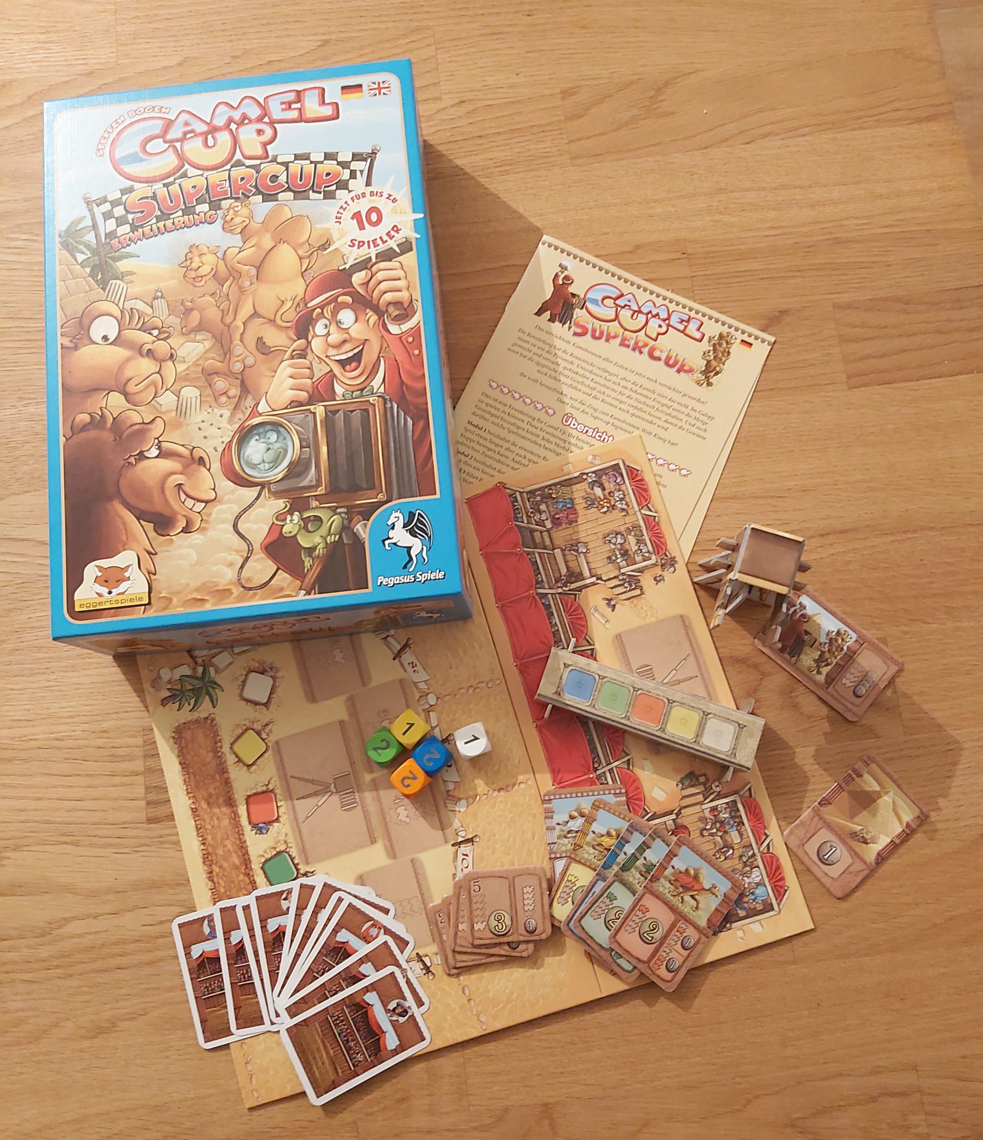 Zu sehen ist Camel Up Supercpu samt Material.