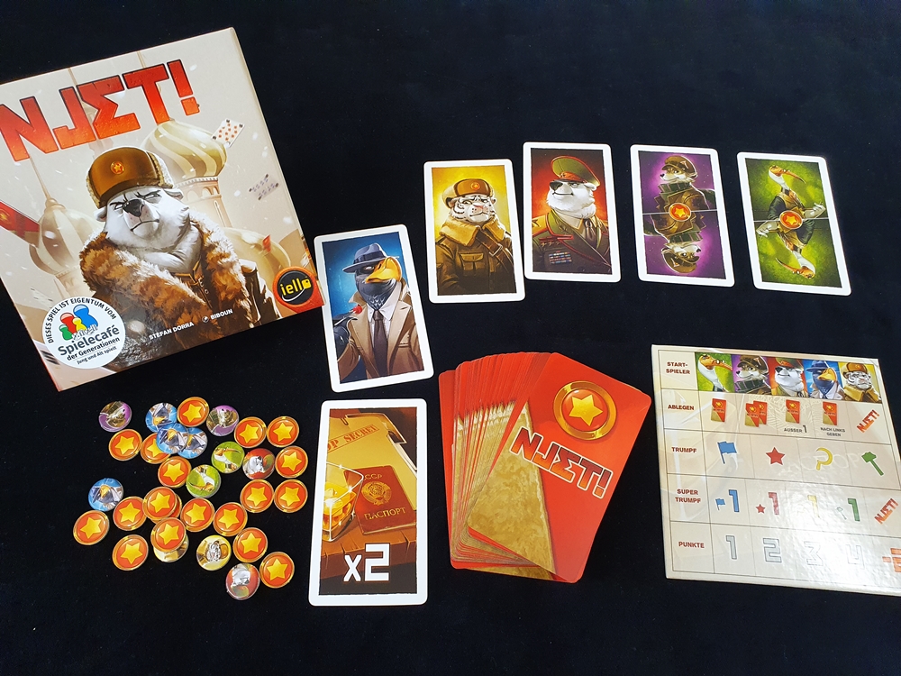 Spielkarton und Inhalt: Spielbrett, Njet-Marker und zahlreiche Karten