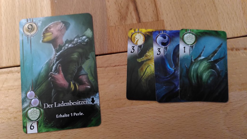 Ein Edler in grün mit einer möglichekn Bezahlung durch Ratsmitglieder in 3 Farben.