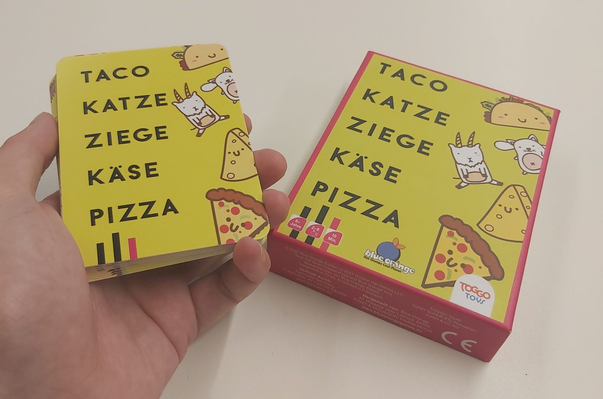 Zu sehen ist das Spiel Taco - Katze - Ziege - Käse - Pizza.