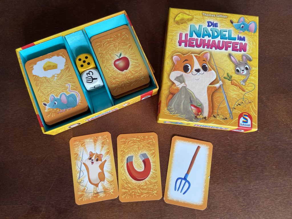 Schachtel und Karten vom Spiel