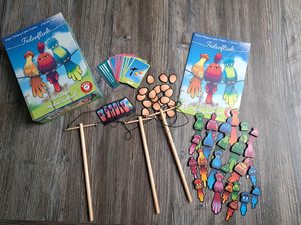 Spielmaterial und Spielkarton