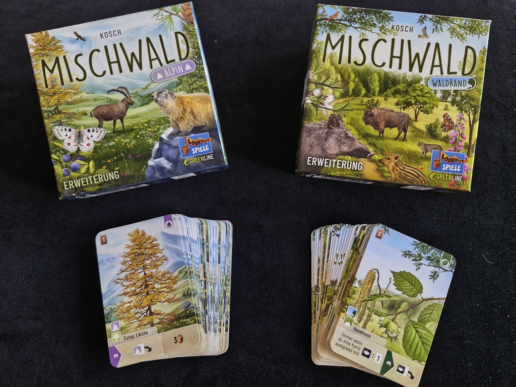 Kartons der Erweiterungen und jeweils 36 Karten