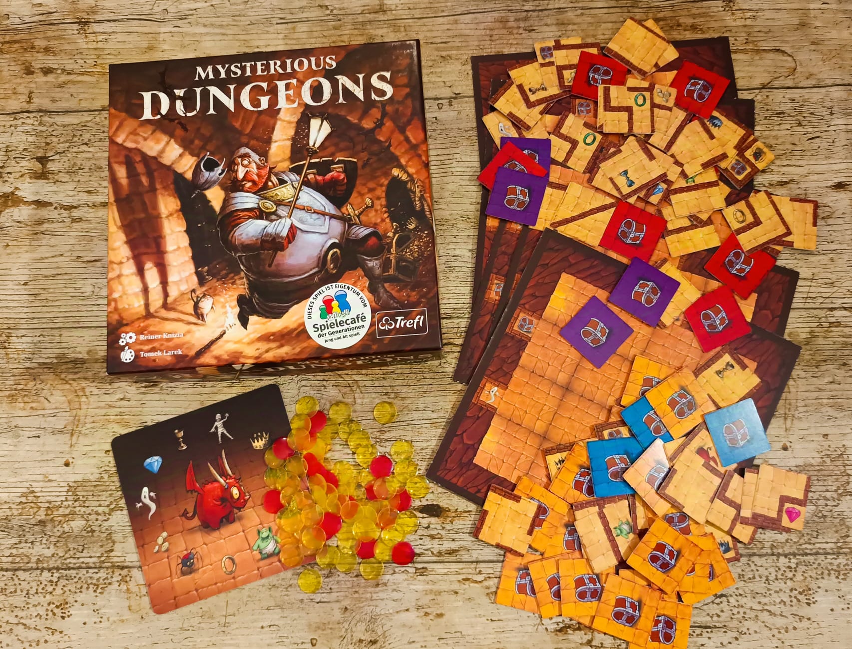 Spielschachtel und Inhalt.